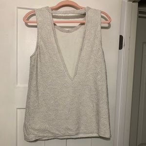 Gently worn plunge back blouse